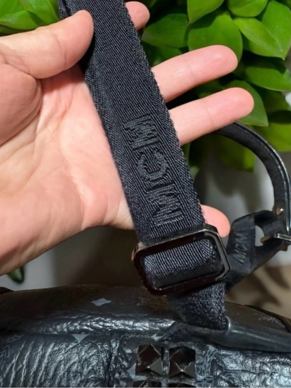 MCM Black Logo-Stamped Leather Mini Backpack with Stud Details